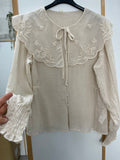 Camisa cuello floral