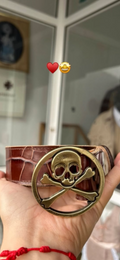 Cinturón calabera